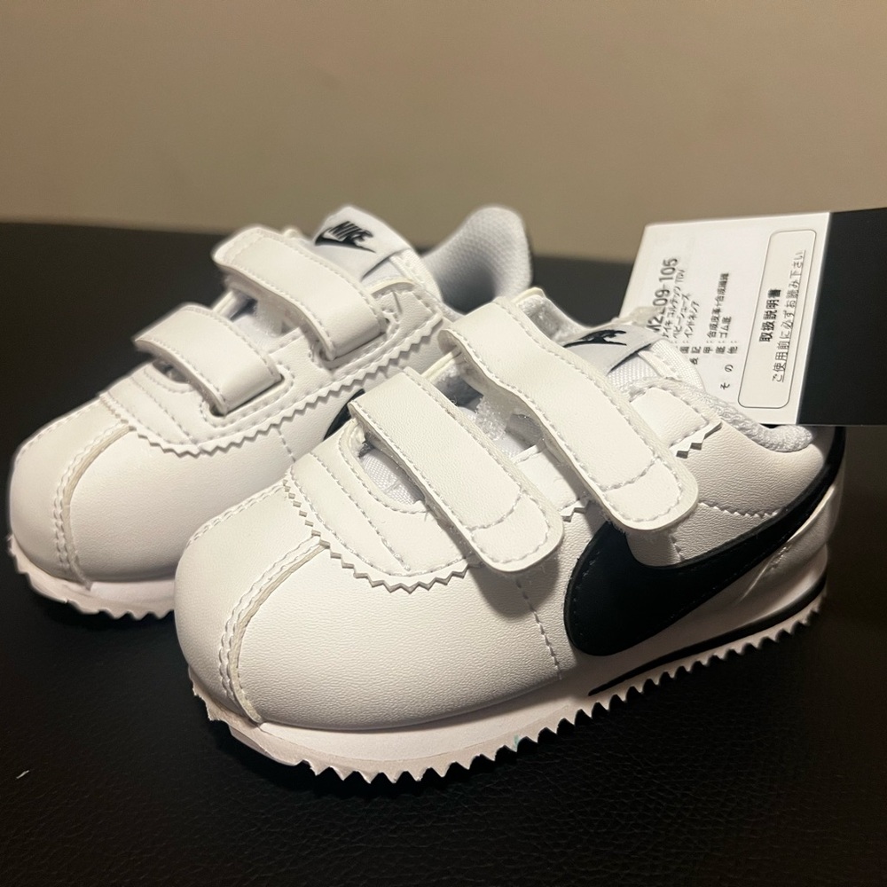 Nike Kids White Sneakers with Black Swoosh and Velcro